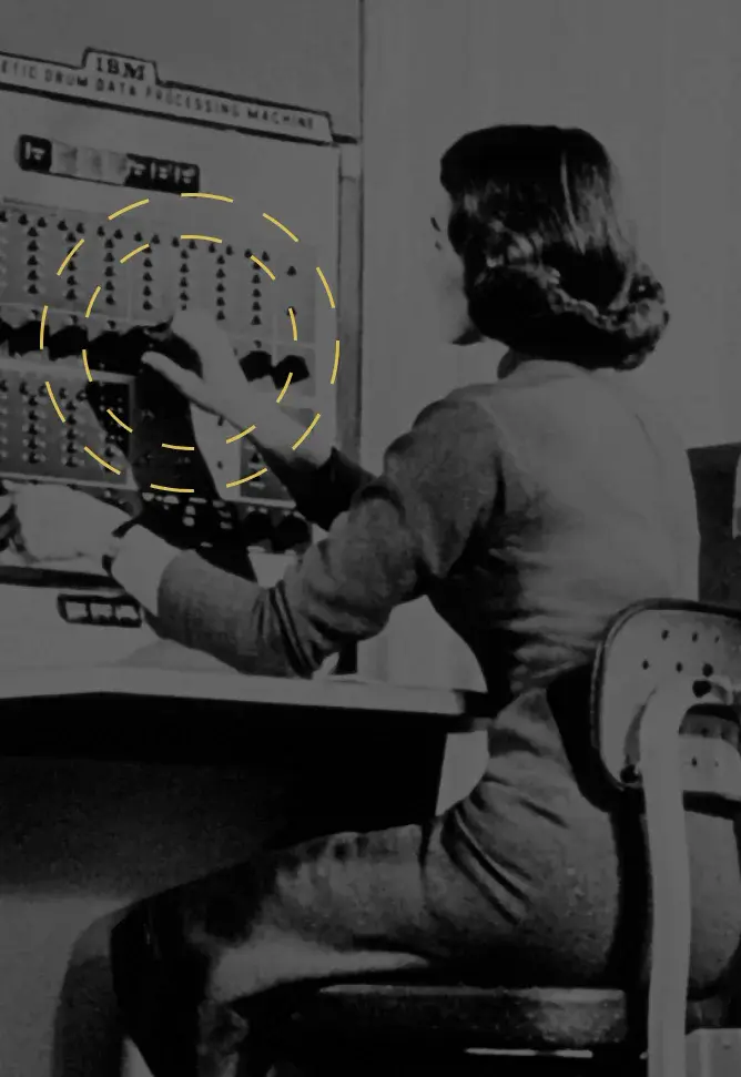 Woman working on a vintage computer representing The Blondes expertise in creating pixel-perfect digital design and online branding